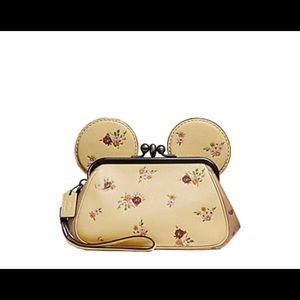 Coach Disney Kisslock Clutch.